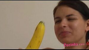 How-to: Youthful brown-haired female trains using a banana